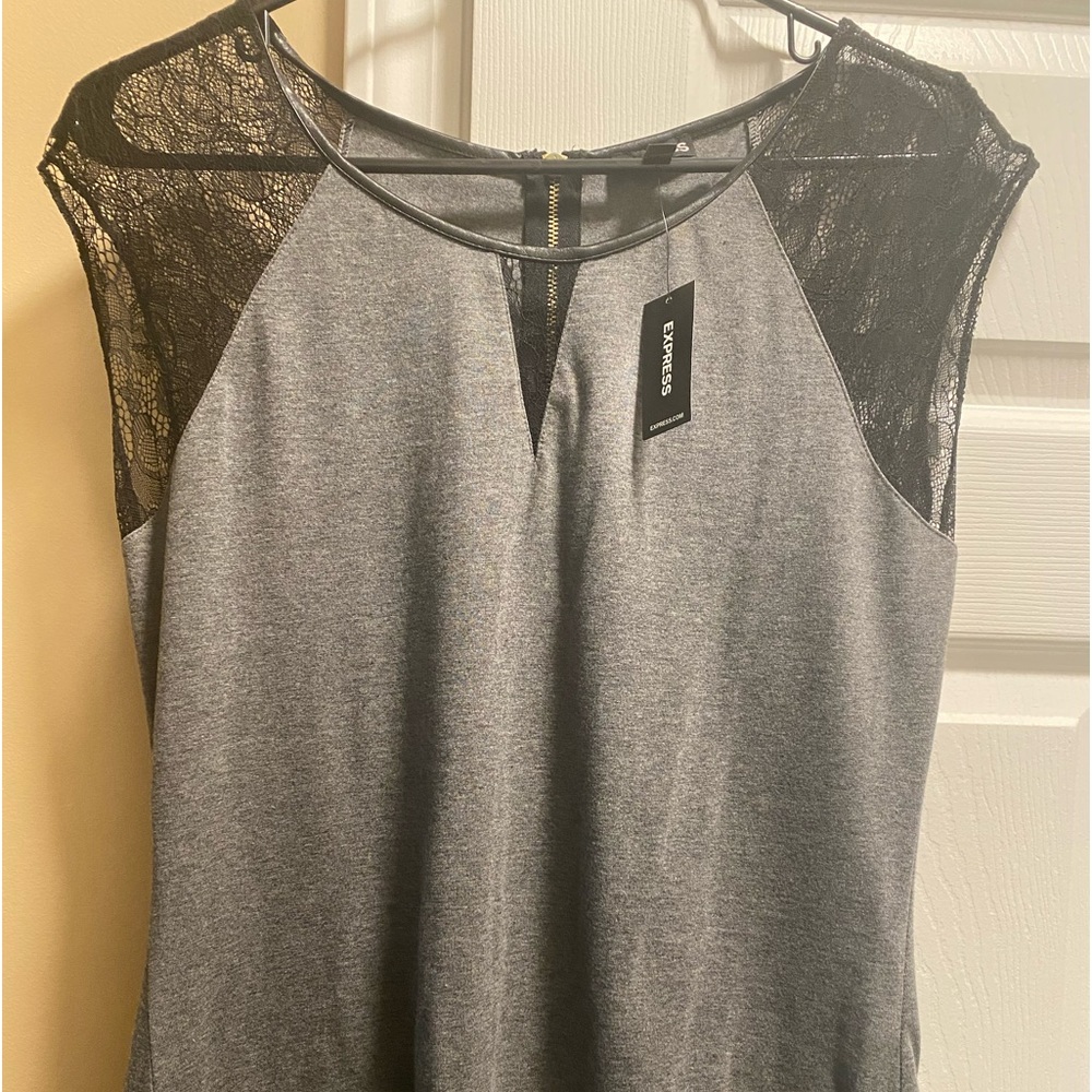 New w/tags.  Women’s Gray Express Shirt.  Cotton material with lace sleeves.